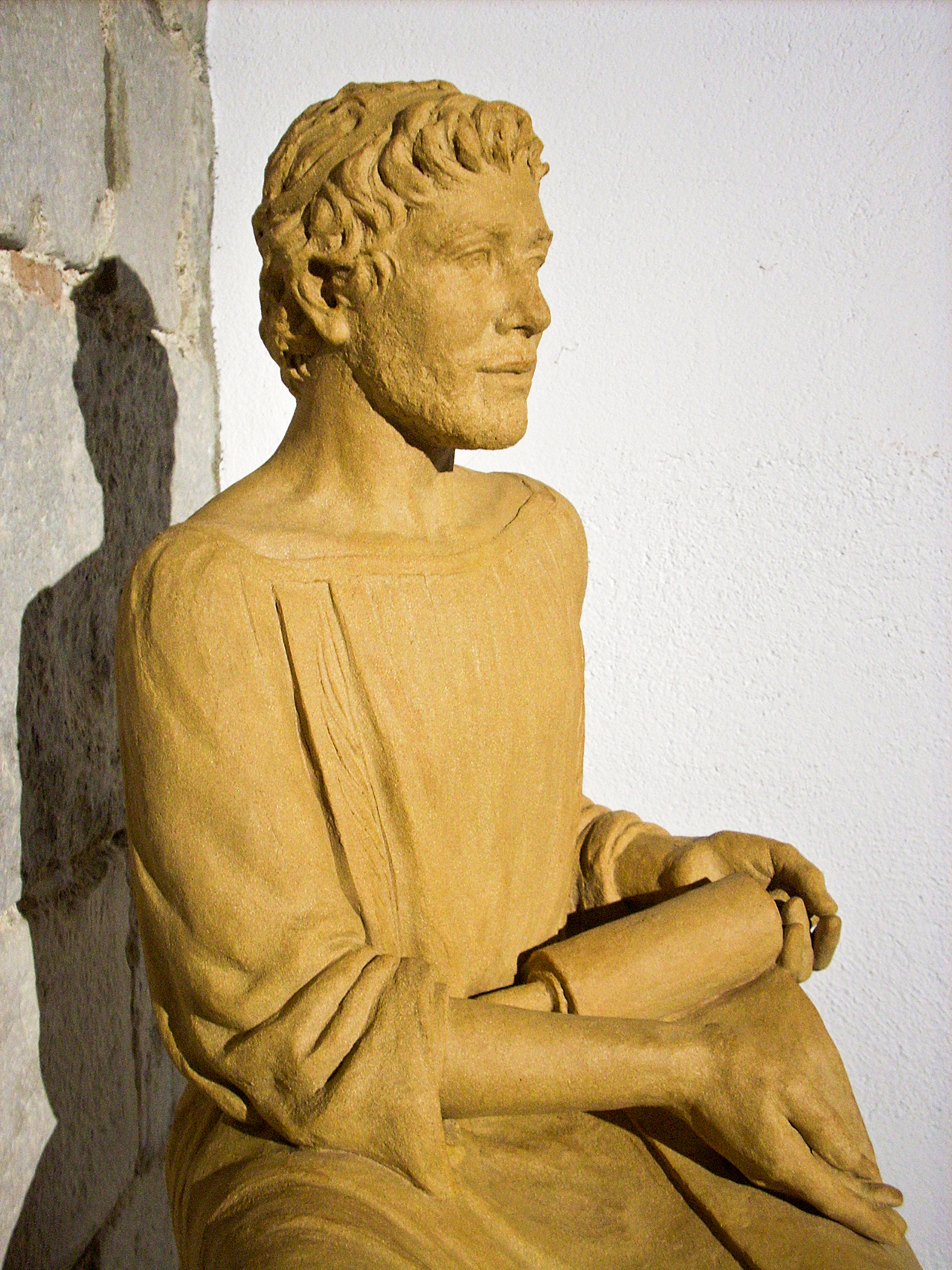 Imatge de Sant Cugat, a l'església de Fornells de la Selva, en terracota